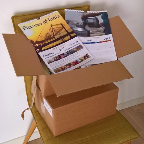 boxes full of 2017 calendars